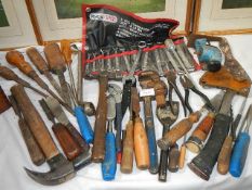 A mixed lot of chisels, spanners etc.