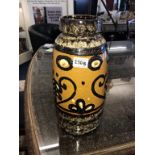 A West German pottery lava vase, circa 1950 / 1960's, mustard glaze, height approximately 38cm.