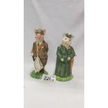 Two Beswick figurines - The Gentleman Pig and The Lady Pig.