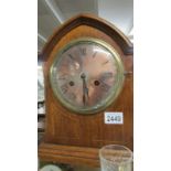 A mahogany inlaid 8 day bracket clock.