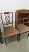 A pair of mahogany inlaid chairs.