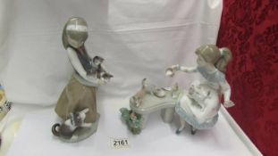 Two Lladro figures - Girl with Kittens and Girl feeding kittens.