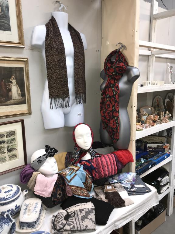 A good lot of scarves including head scarves, some new items and 2 torso wall art figures.