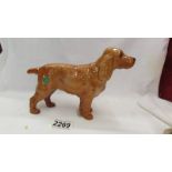 A Beswick spaniel.