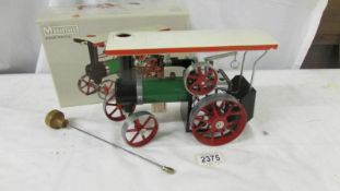 A boxed Mamod TE1A steam tractor.