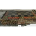 A Chinese export lacquer gaming compendium comprising a box with chequer board and back gammon with