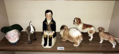 A selection of pottery dogs, Trentham elephant, Tony Wood & Robert Burns etc.