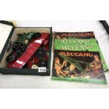 A collection of vintage Meccano and 4 instruction manuals