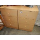 A pair of three drawer bedsides.