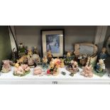 A quantity of pig figurines etc.