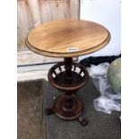 A Victorian circular mahogany lamp table with bobbin turned needlework gallery,