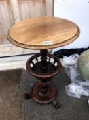 A Victorian circular mahogany lamp table with bobbin turned needlework gallery,