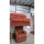 A two seat sofa with matching electric reclining chair.