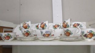 A 20 piece Royal Vale fruit decorated tea set.