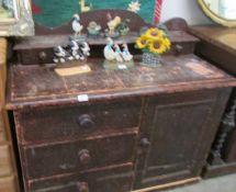 A stained pine Lincolnshire dresser.