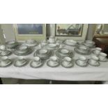 In excess of 90 pieces of Noritake Doral Blue pattern tea and dinner ware (12 place setting but