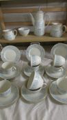 Approximately 30 pieces of Royal Doulton "Hampton Court" pattern tea ware.