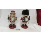 Two nutcracker dolls.