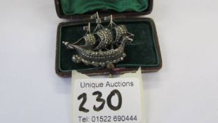 A boxed marcasite brooch of galleon form.