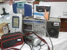 A quantity of radios etc.