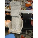 A Loyd Loom chair and stools.
