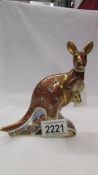 A Royal Crown Derby "The Australian Collection" kangaroo with Joey, gold stopper, in good condition.