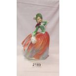 A Royal Doulton figure 'Autumn Breezes', HN1911.