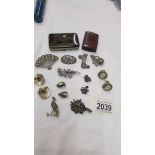 A quantity of circa 1940/50's marcasite brooches, mainly silver, pheasant, fan, flower etc.