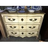 A French style three drawer chest.