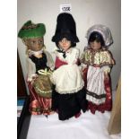 A collection of 3 traditionally dressed doll's bought at Redgates toy shop Sheffield,