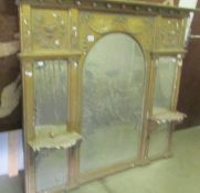 A Regency style overmantel mirror, in need of a good clean.
