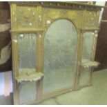 A Regency style overmantel mirror, in need of a good clean.