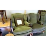 A pair of mahogany framed cabriole leg wing armchairs.