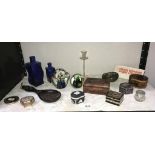 A shelf of miscellaneous including trinket boxes, black Wedgwood jasperware,