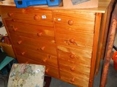 A ten drawer pine chest.