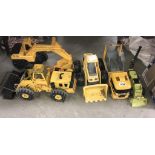 A quantity of Tonka diggers & other construction vehicles