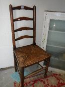 A ladder back chair.