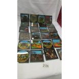 In excess of 60 coloured glass lantern slides, mainly military with some farming.