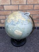 A 1930's 12 inch terrestrial globe, papers published by George Philip & son,