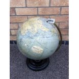 A 1930's 12 inch terrestrial globe, papers published by George Philip & son,