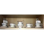 A pretty 14 piece tea set with milk jug & sugar bowl