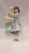 A limited edition Royal Worcester figurine - 'Love', 3146/9500.