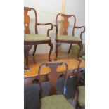 A set of 6 high back chairs comprising 2 carvers and 4 diners.