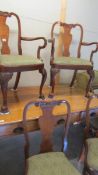 A set of 6 high back chairs comprising 2 carvers and 4 diners.