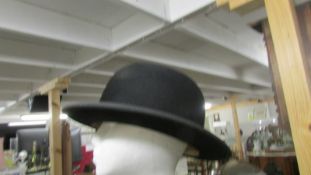 A Perfecta half size bowler hat.