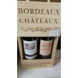 2 bottles of cased Chateau Bordeau wine.