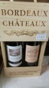 2 bottles of cased Chateau Bordeau wine.