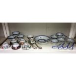 A quantity of Chinese rice dishes & spoons