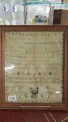 A framed and glazed sampler "Henrietta Little, Aged 13 years, 26/8/1790".