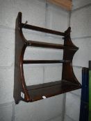 A small Ercol shelf unit, 42 x 28 x 21 cm.